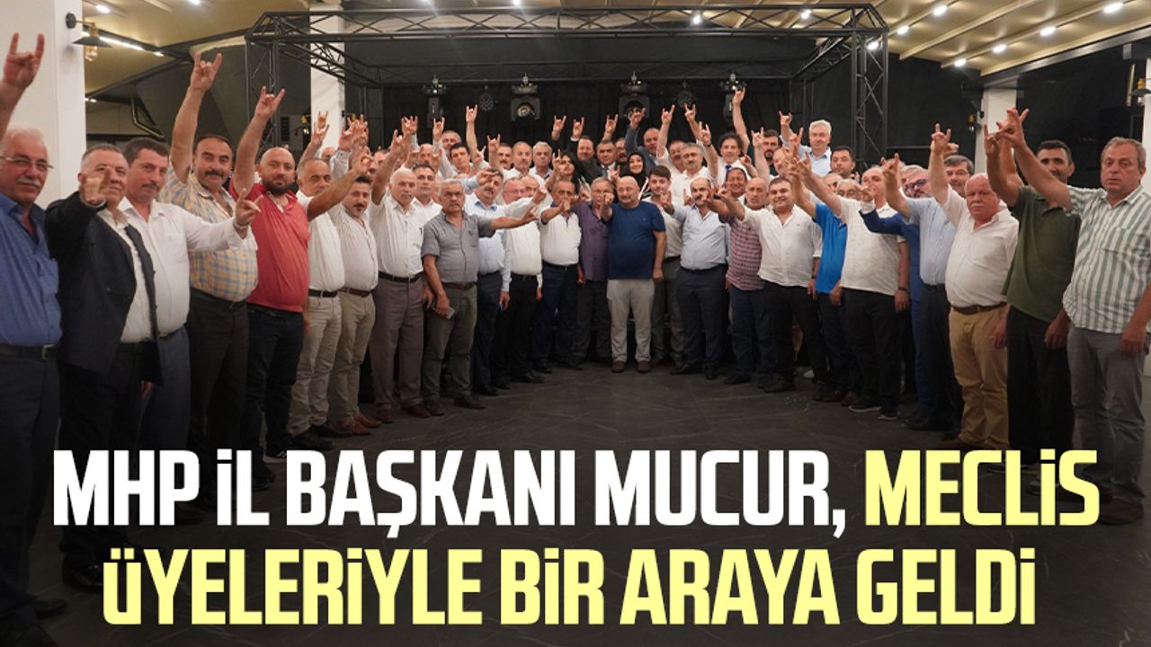 MHP İl Başkanı Burhan Mucur, meclis üyeleriyle bir araya geldi 