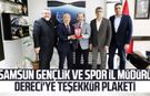 Samsun Gençlik ve Spor İl Müdürü Feyzullah Dereci'ye teşekkür plaketi