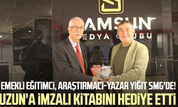 Emekli eğitimci, araştırmacı-yazar Hasan Yiğit SMG'de! Necdet Uzun'a imzalı kitabını hediye etti