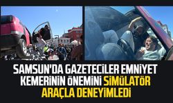 Samsun'da gazeteciler emniyet kemerinin önemini simülatör araçla deneyimledi