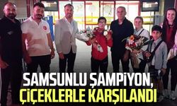Samsunlu şampiyon Ahmet Eymen Danacı, çiçeklerle karşılandı