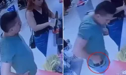 Belindeki silahı düzeltirken kendini ve kasiyeri vurdu