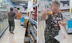 Markette "yok artık" dedirten görüntüler! Tek tek yere attı
